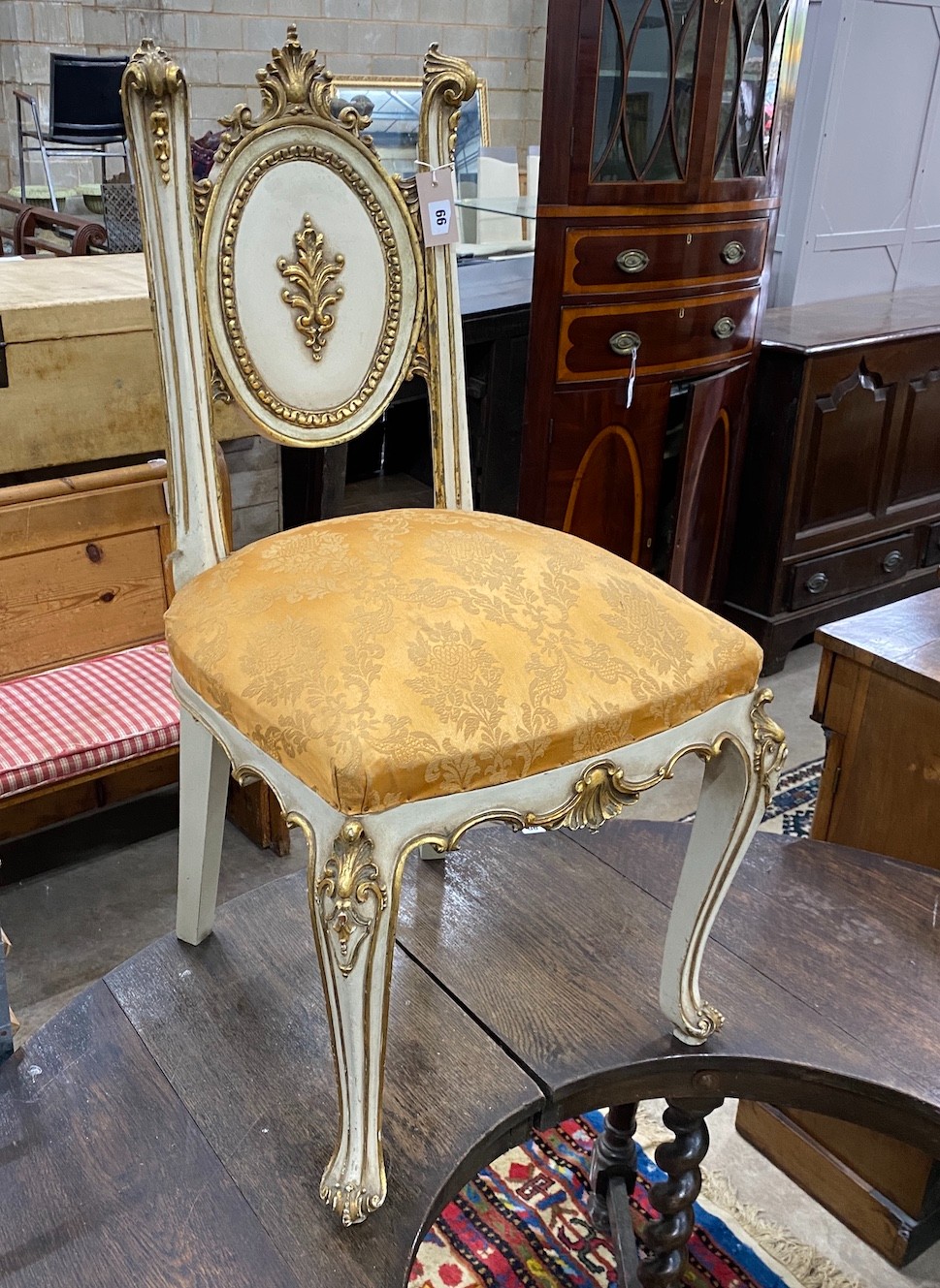 An Italian gilt and cream painted side chair